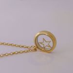 Picture of Star locket necklace | golden